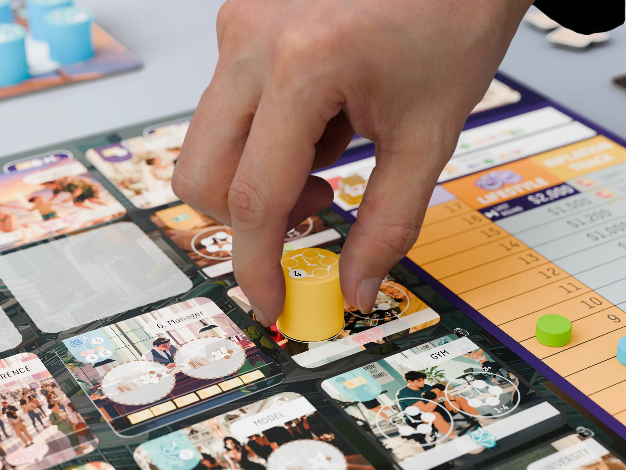 A hand placing a yellow time marker on the Financial Freedom board